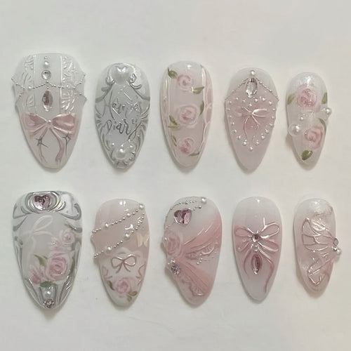 Artistic nail extensions with elegant flower decoration Bowlift