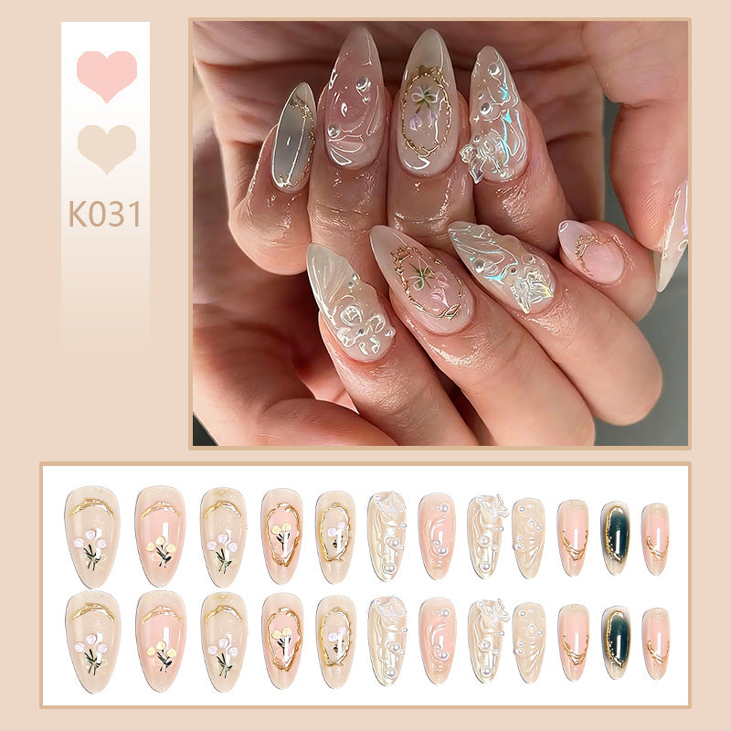 Elegant artificial nails with holographic and floral decorations Bowlift