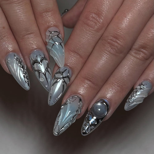 Artful stiletto nails with playful metallic details Bowlift