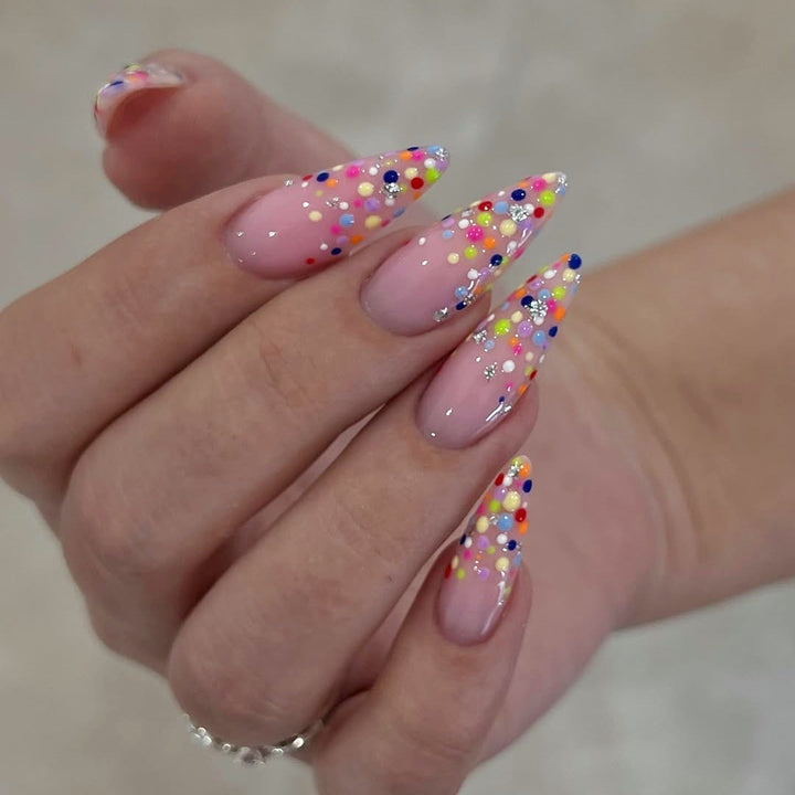 Acrylic nail set with colorful glitter dots and elegant tips Bowlift