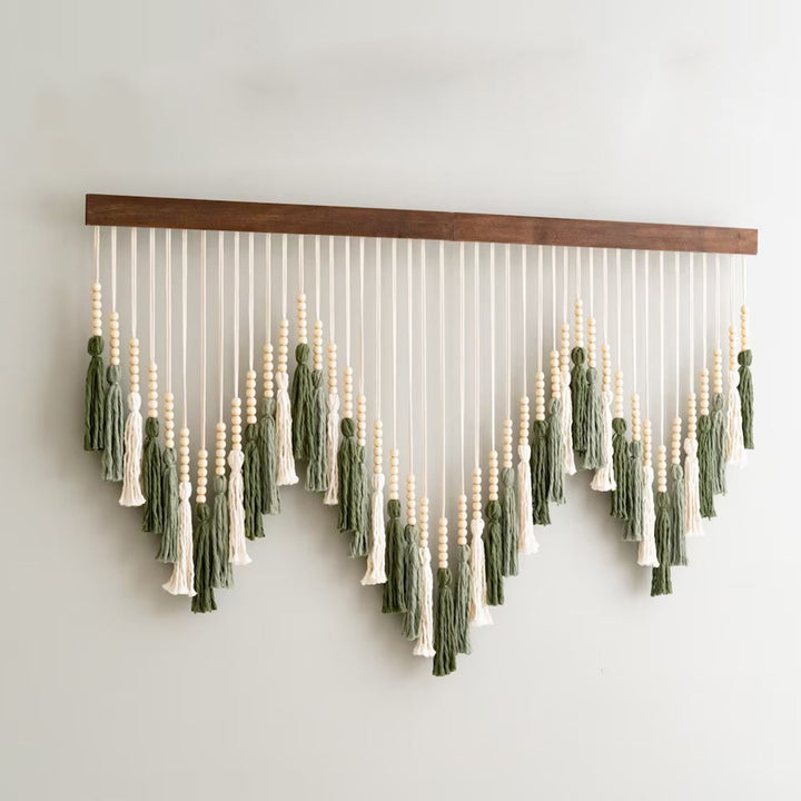 Artful macramé wall hanging with gradient and elegant tassels