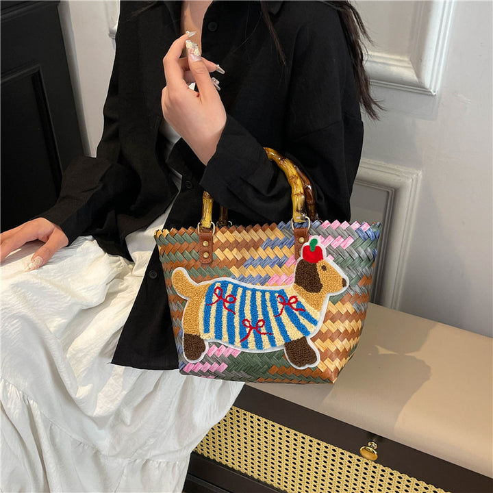 Shoulder bag with playful dog motif Bowlift