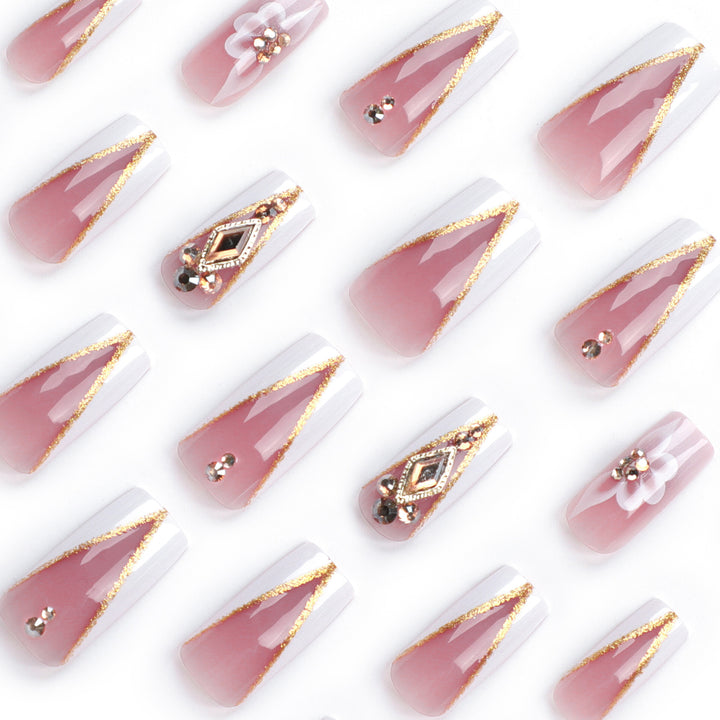 Artistic nail extensions with floral and glitter accents Bowlift