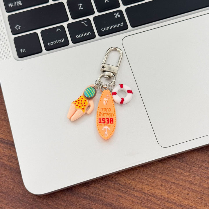 Keychain with Creative Swimming Motif Bowlift