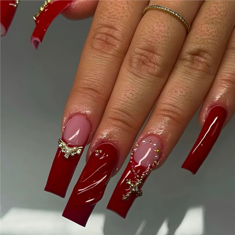 Elegant Press-On Nail Art with Gold Embellishments Bowlift