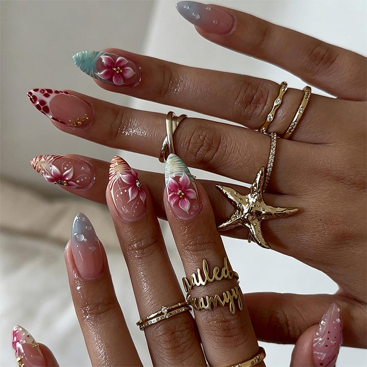 Artificial nail set with floral designs and glamorous accents Bowlift