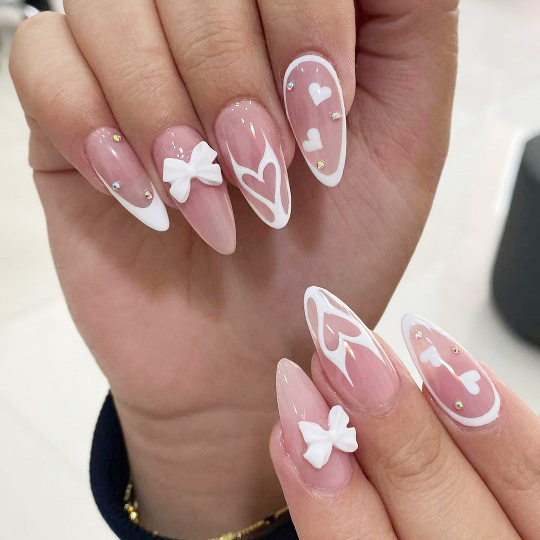 Artistic stiletto nails with heart design Bowlift