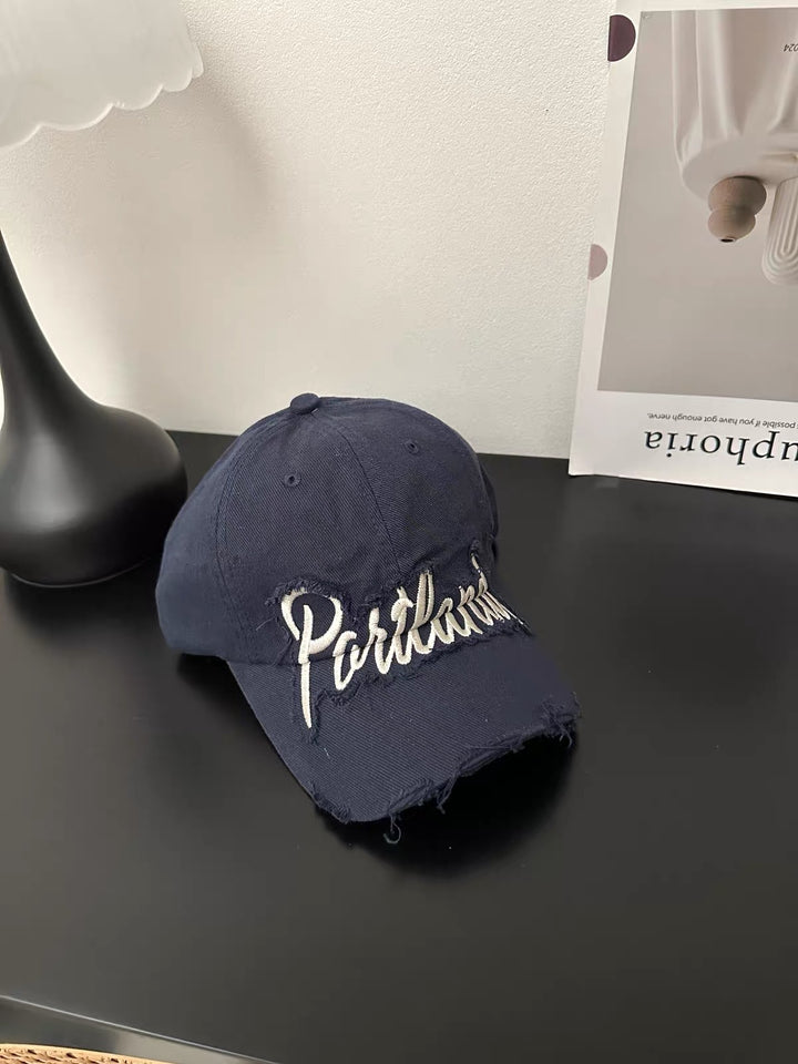 Distressed Denim Baseball Cap with Embroidered Text