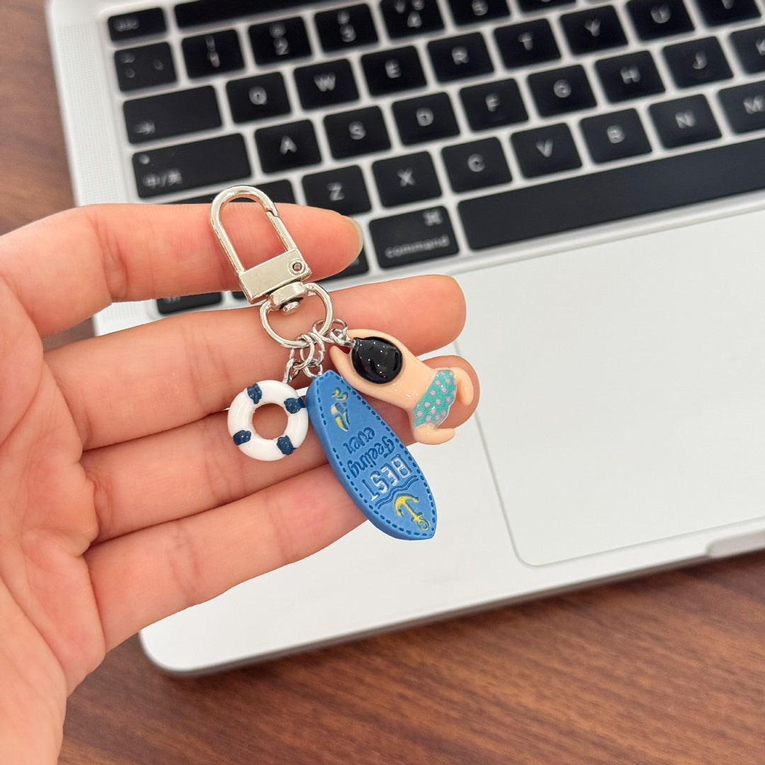 Keychain with Creative Swimming Motif Bowlift