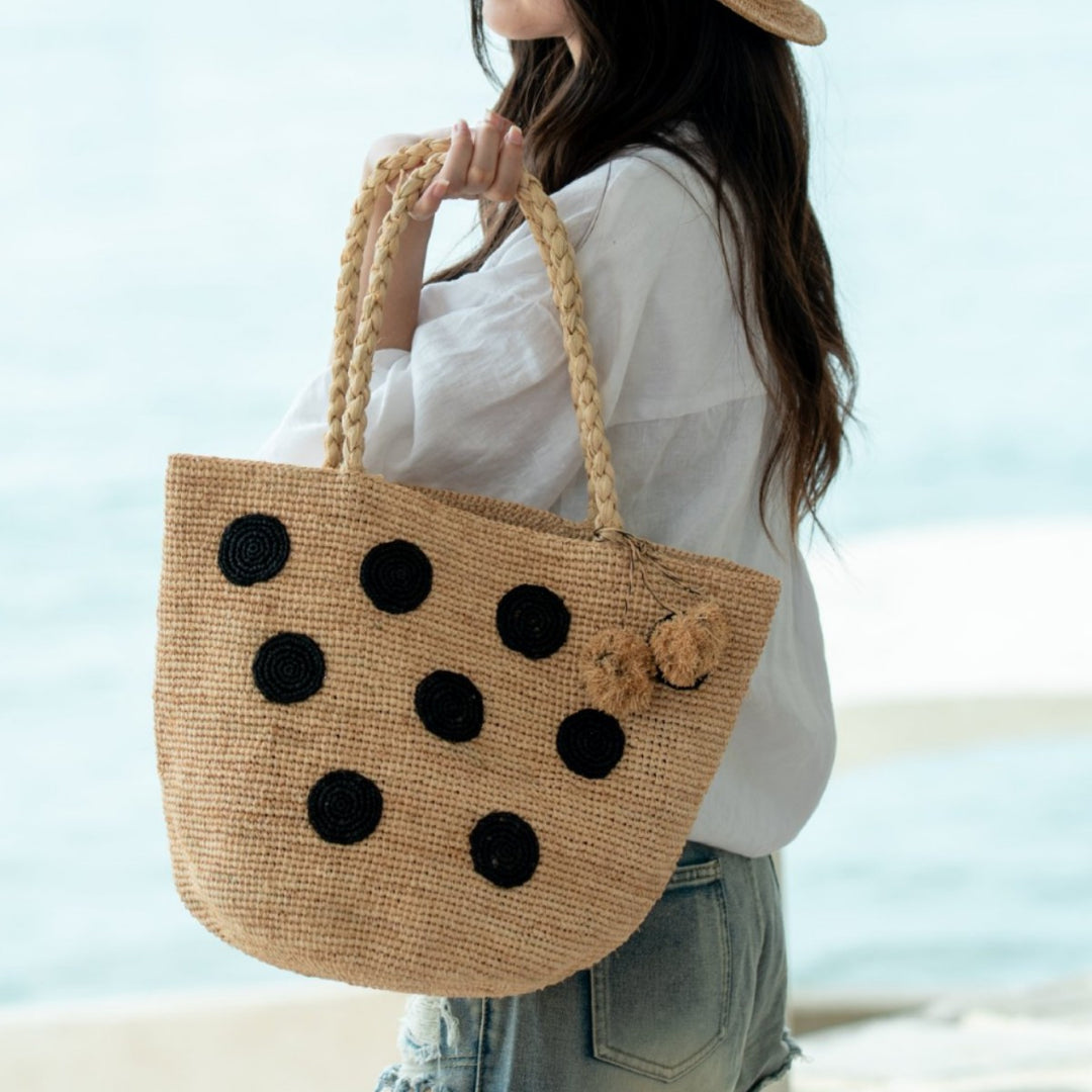 Handcrafted straw bag with eye-catching accents Bowlift