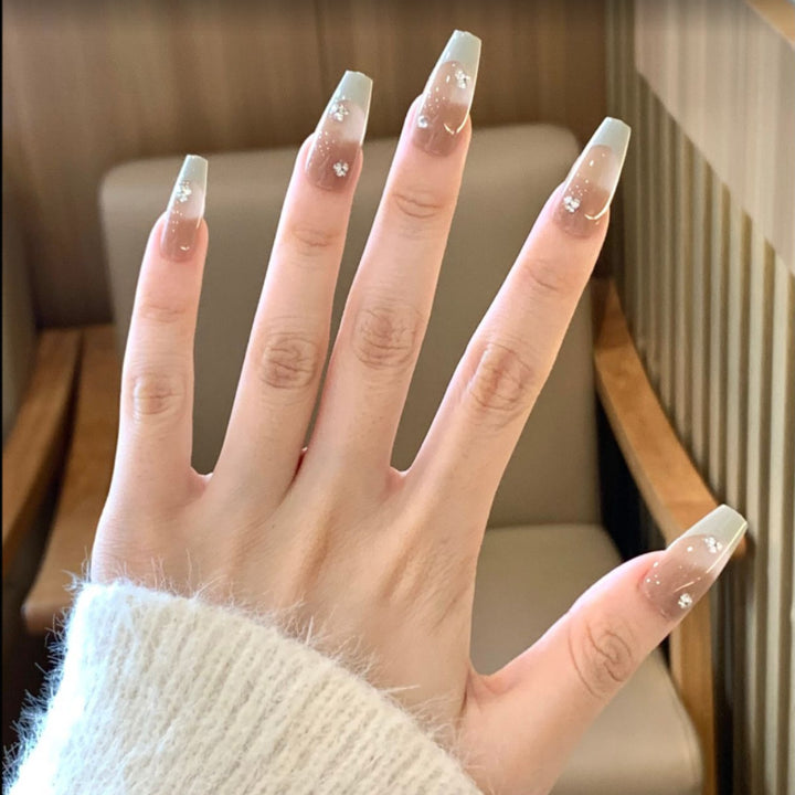 Artistic Press-On Nail Set with Floral and Gemstone Accents Bowlift
