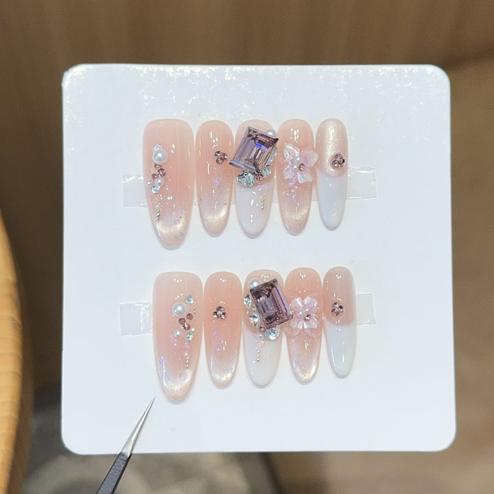 Artificial nails with elegant jewelry details Bowlift