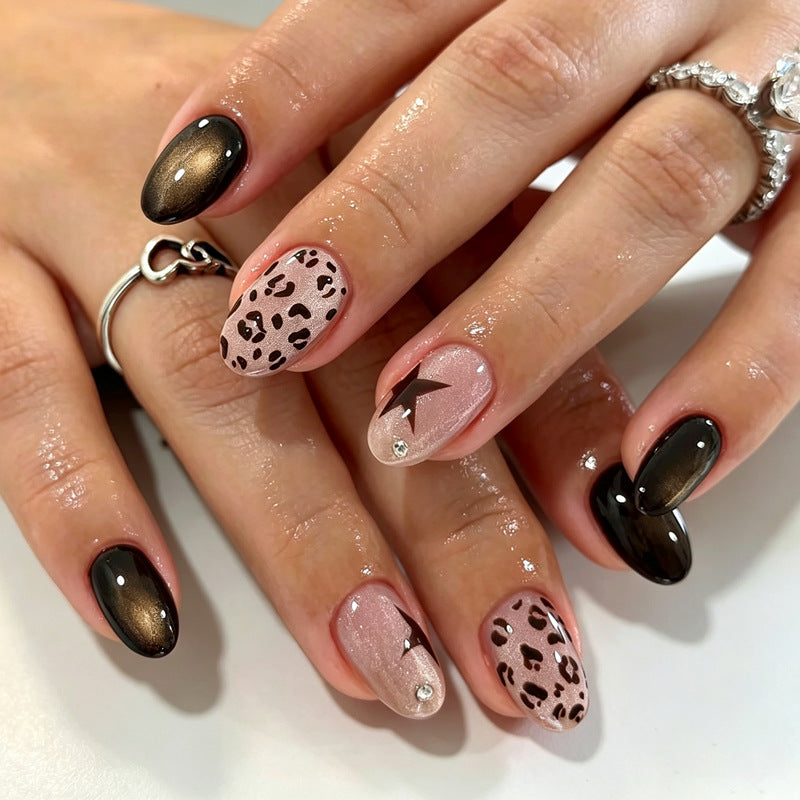Artificial nails in modern animal print design Bowlift