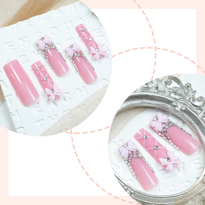 Artificial nail set with romantic bow and glitter accents Bowlift
