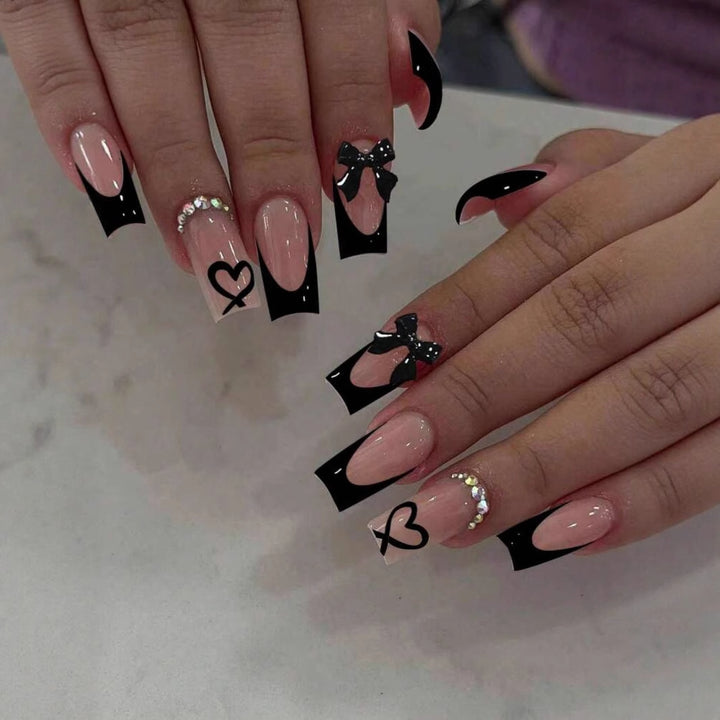 Acrylic nail set with elegant heart and bow design Bowlift
