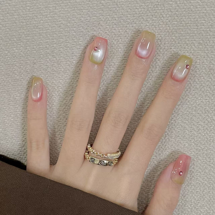 Artificial artificial nails with elegant ombre effects and glitter accents Bowlift