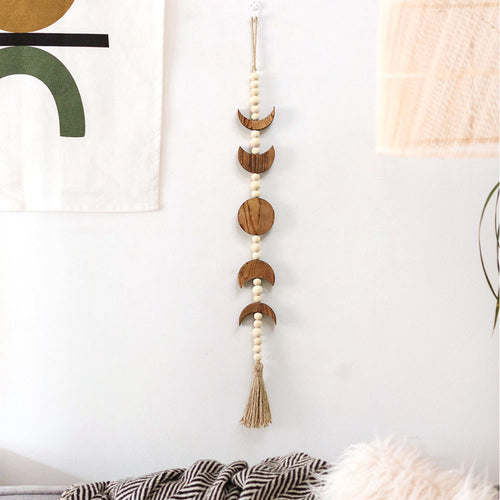 Decorative wall hanging with geometric wooden shapes