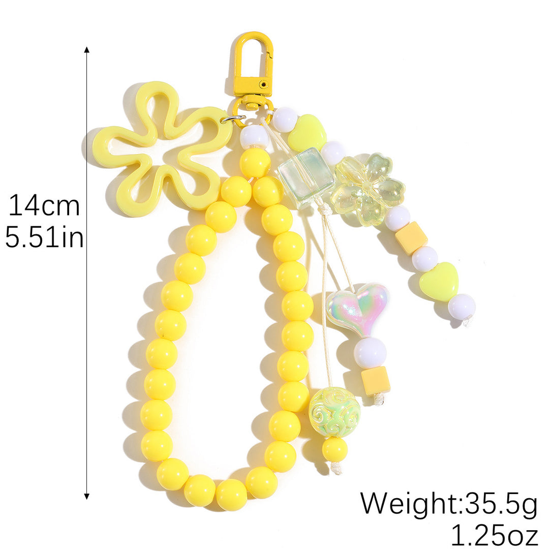 Playful keychain with flower and butterfly details Bowlift