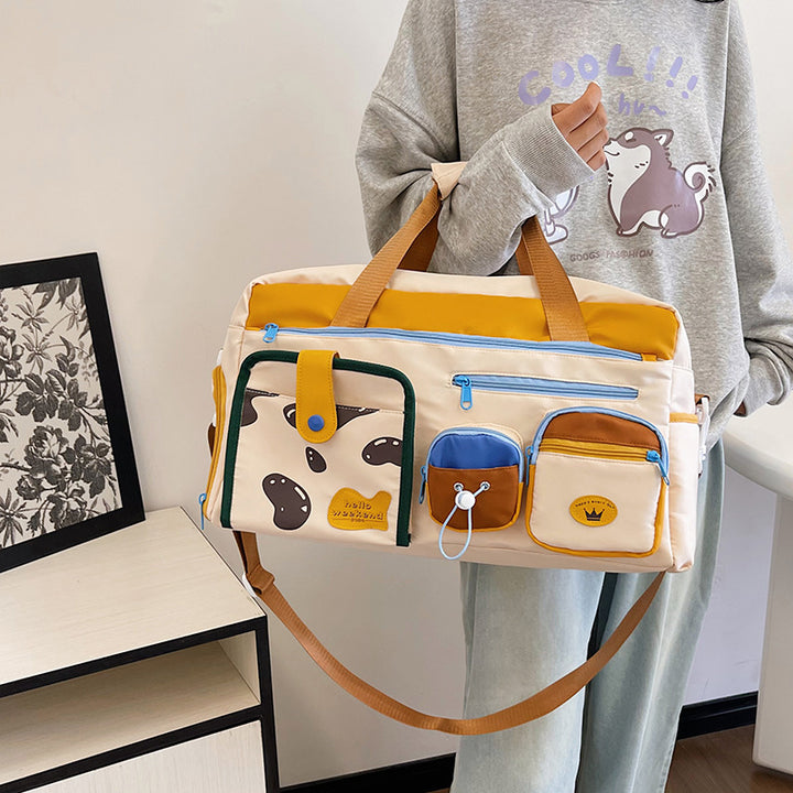 Playful Pet-Themed Travel Duffle Bag Bowlift