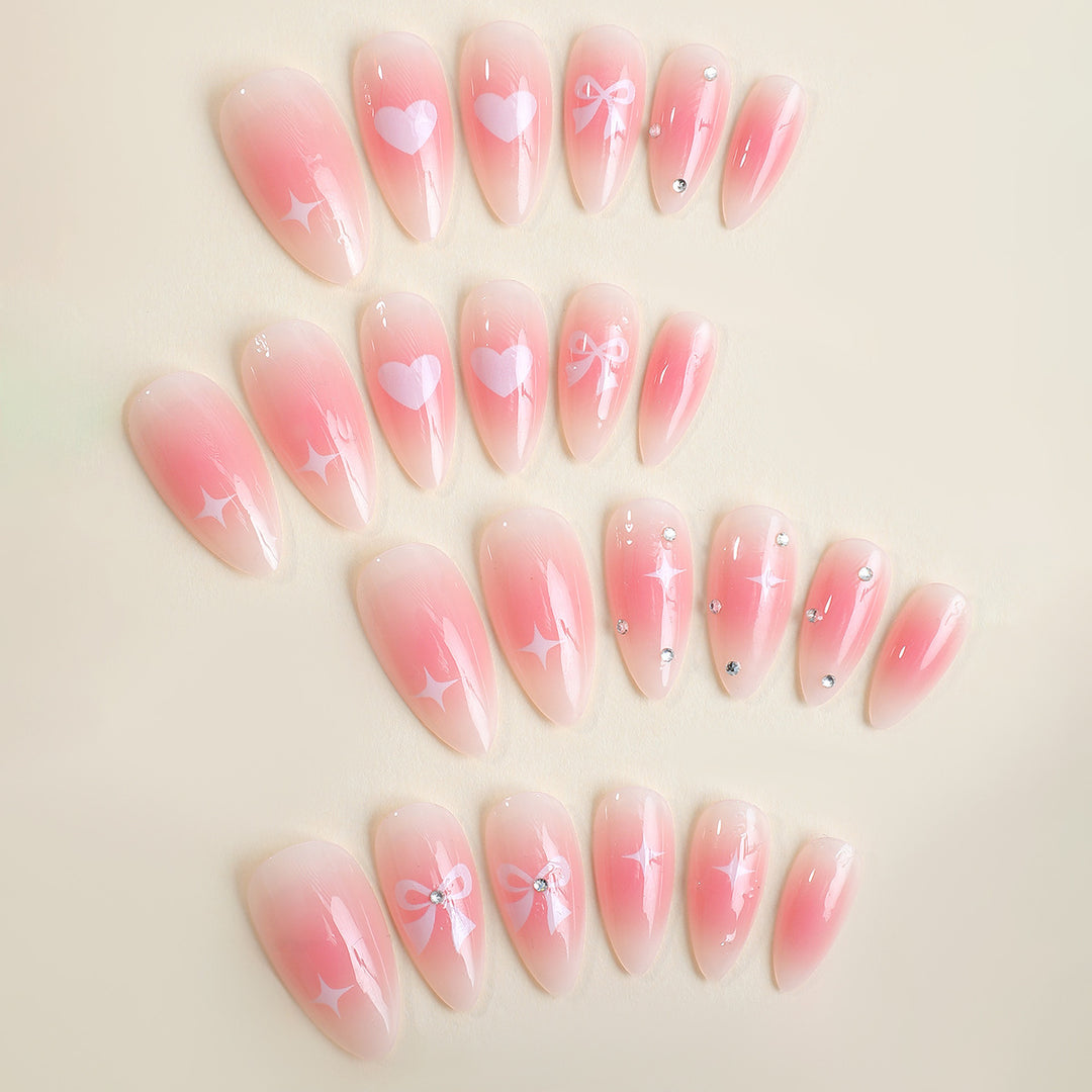 Acrylic nail set with romantic heart and bow design Bowlift