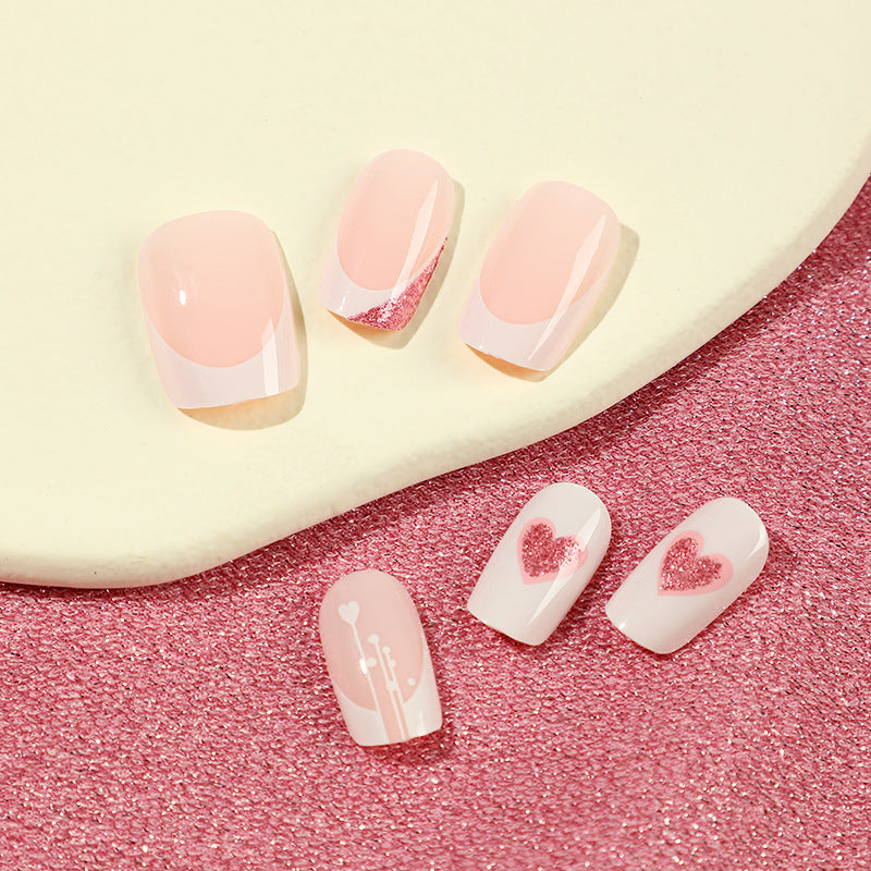 Artful nail designs with heart and glitter accents Bowlift