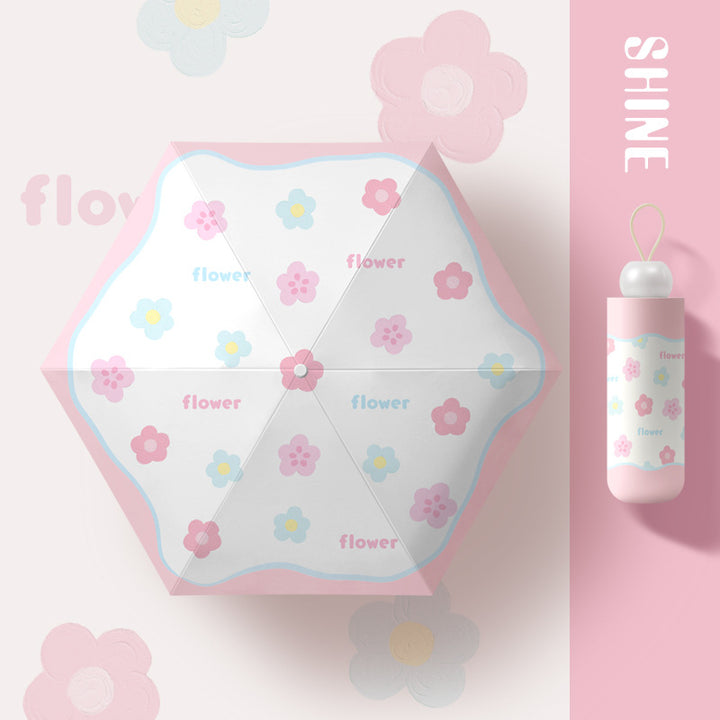 Ladies folding umbrella with playful flower design Bowlift