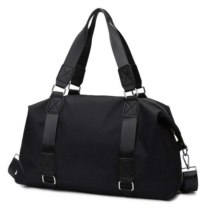 Sports bag with ergonomic carrying handles and versatile interior Bowlift