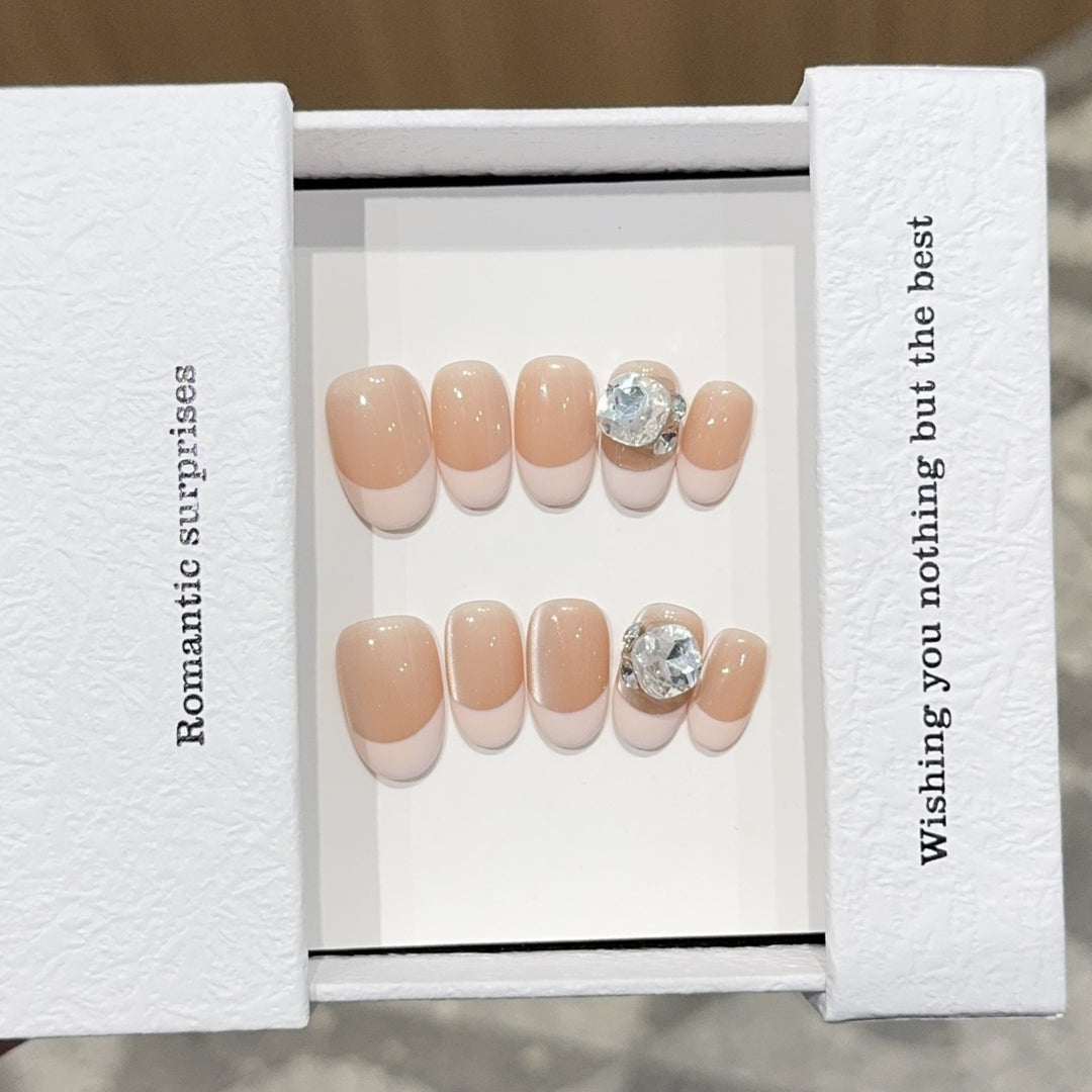 Artificial nail tips with elegant rhinestone accents Bowlift