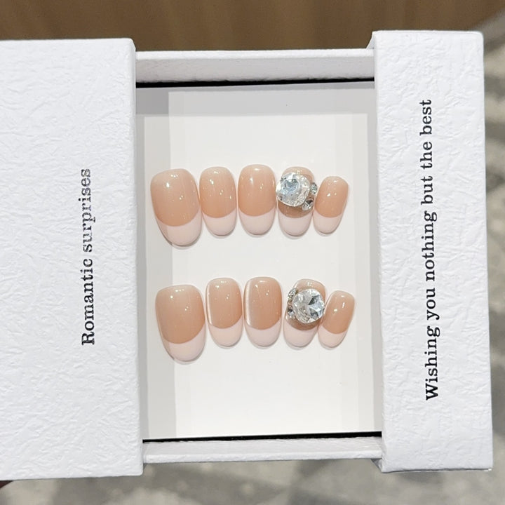 Artificial nail tips with elegant rhinestone accents Bowlift
