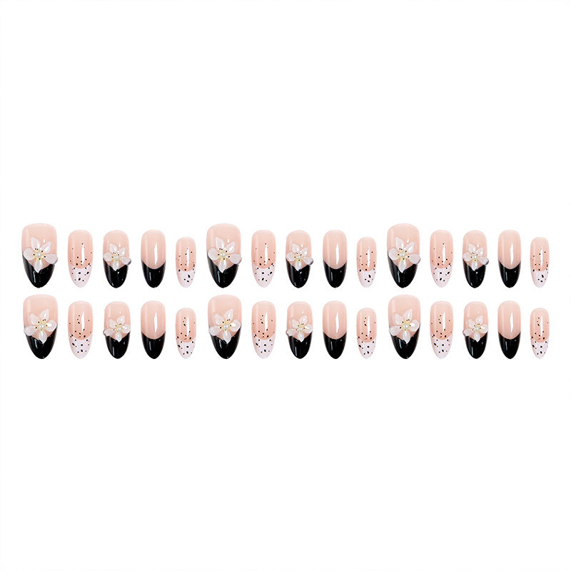 Artful nail tips with floral embellishments Bowlift