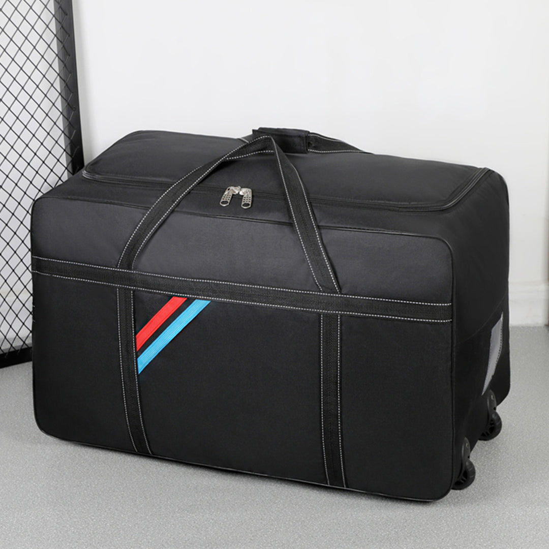 Spacious travel bag with lightweight wheels and reinforced carrying handle Bowlift