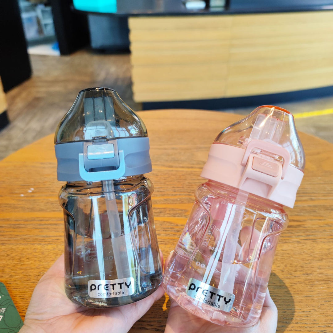Women's ergonomic drinking bottle with secure screw cap Bowlift
