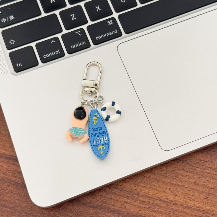 Keychain with Creative Swimming Motif Bowlift