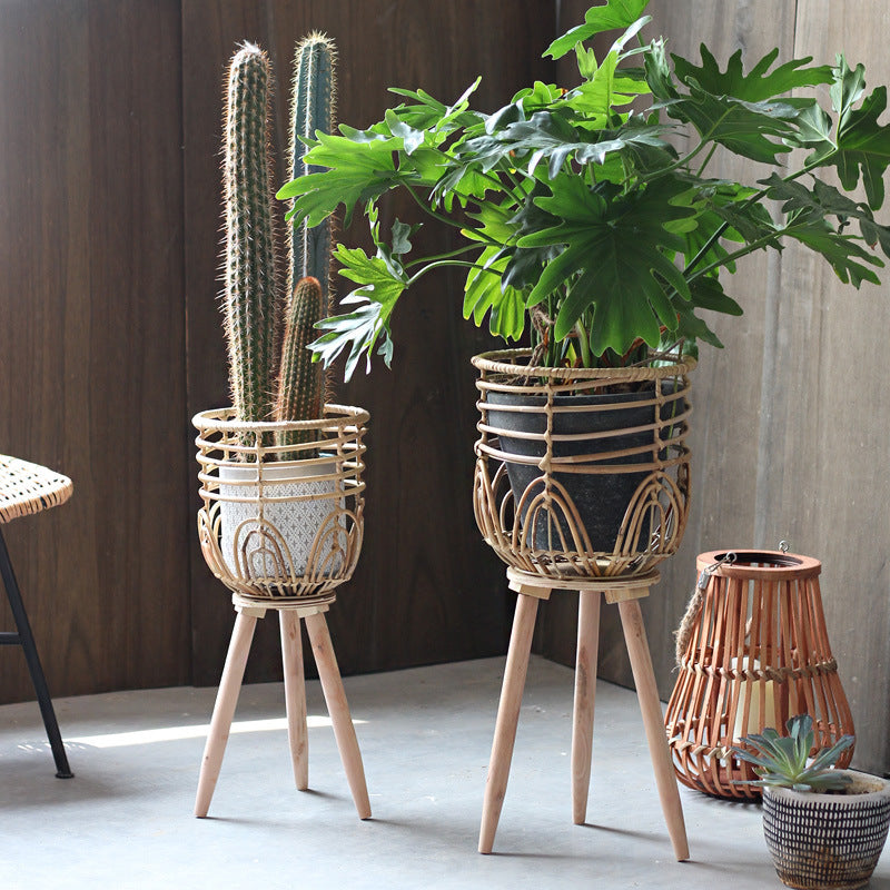 Stylish plant stand made of rattan and wood Bowlift