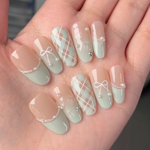 Decorative Press-On Nail Extensions with Bow and Rhinestone Accents Bowlift