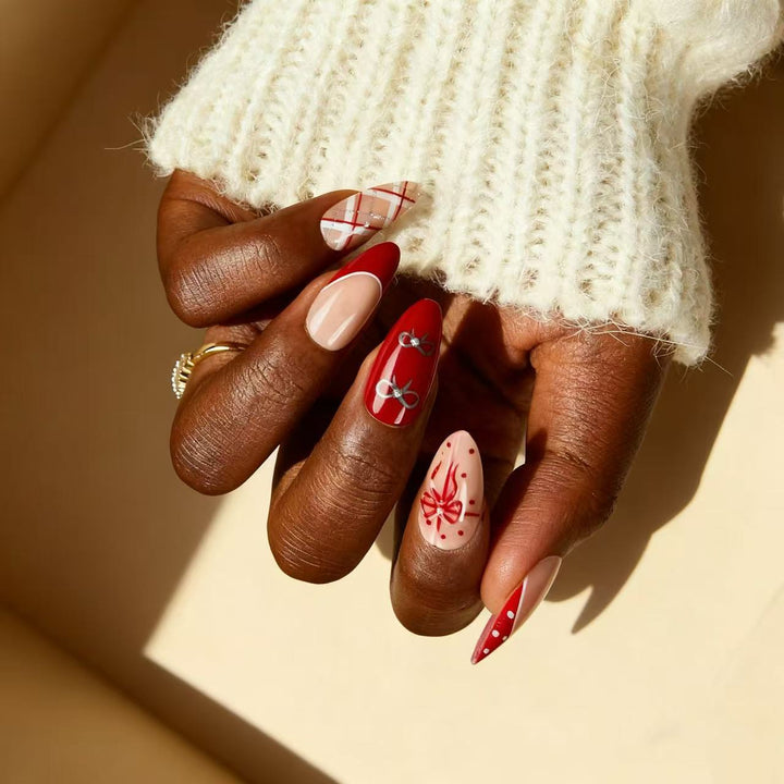 Artful nail extensions with elegant patterns and embellishments Bowlift