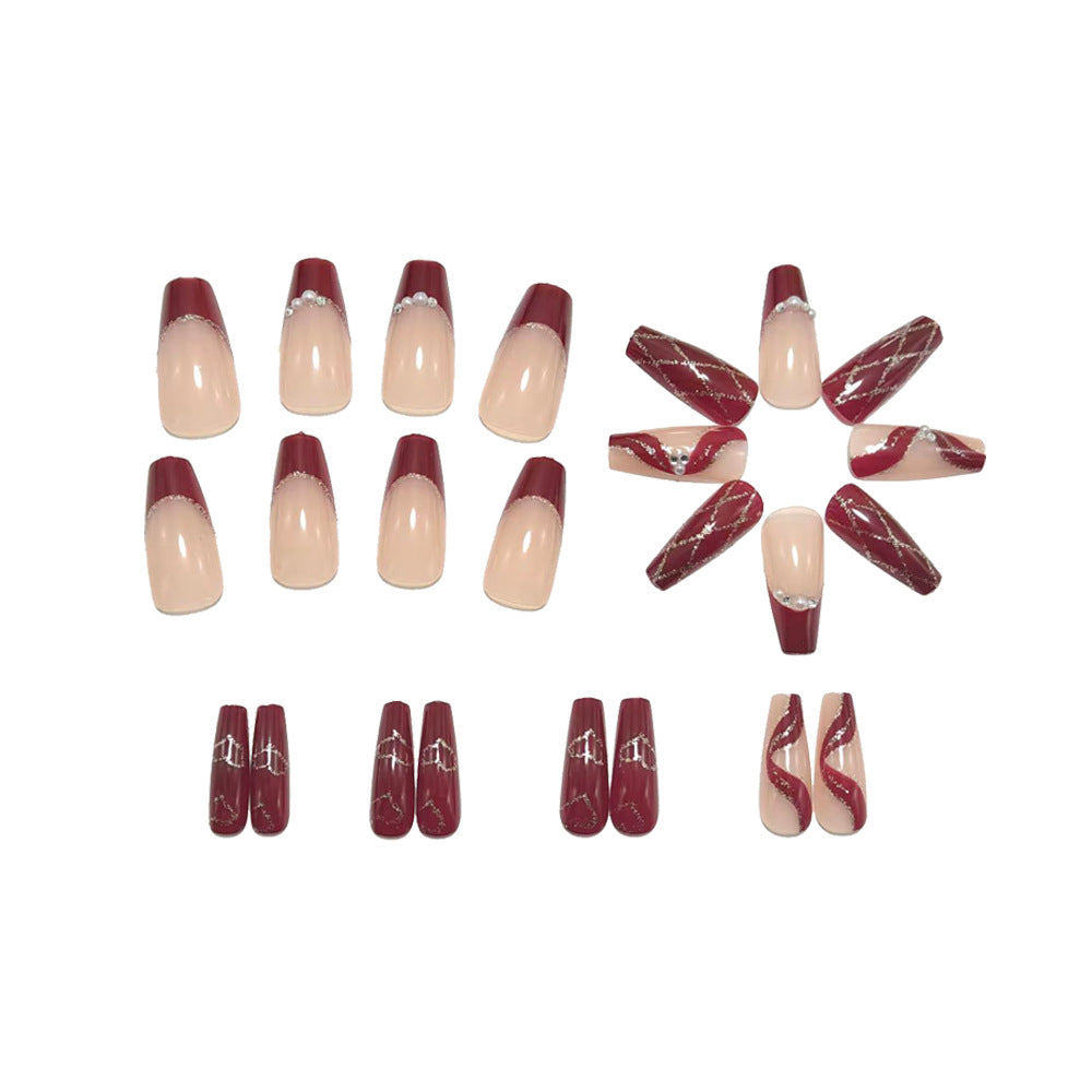 Artificial nails with elegant pearl and glitter decorations Bowlift