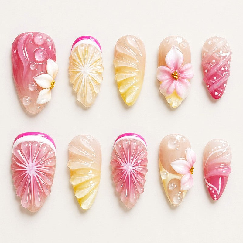 Artificial nail set with elegant floral details and glitter effects Bowlift