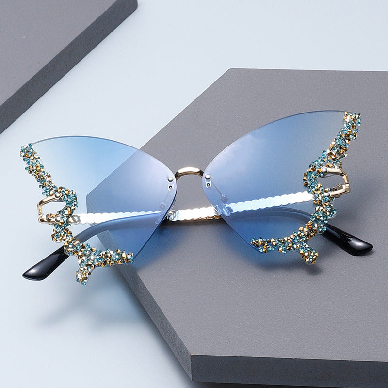 Women's extravagant sunglasses with sparkling butterfly design Bowlift