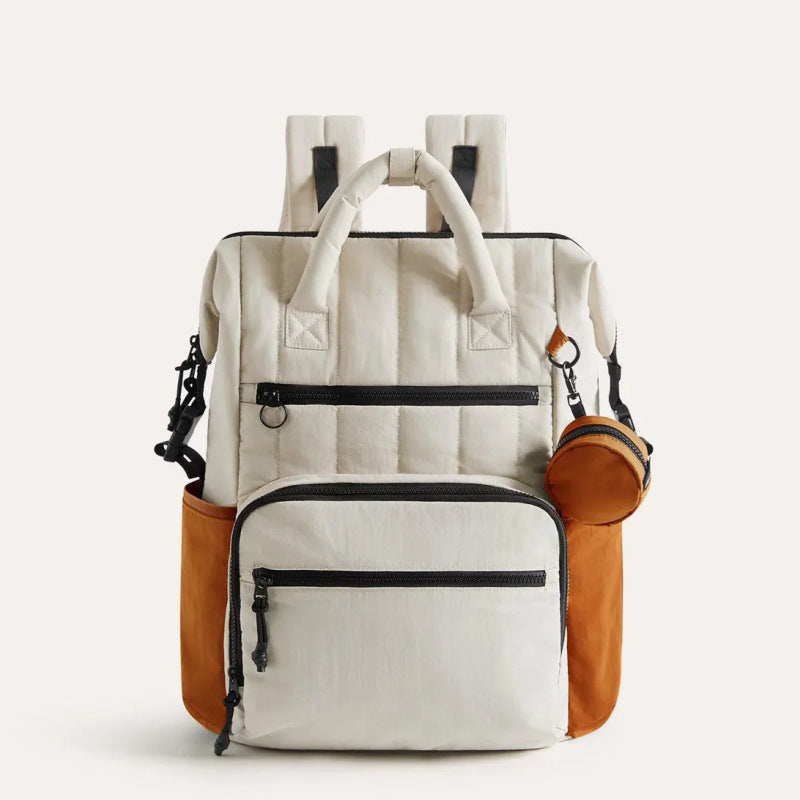 Multifunctional backpack with padded carrying handles and multiple compartments Bowlift