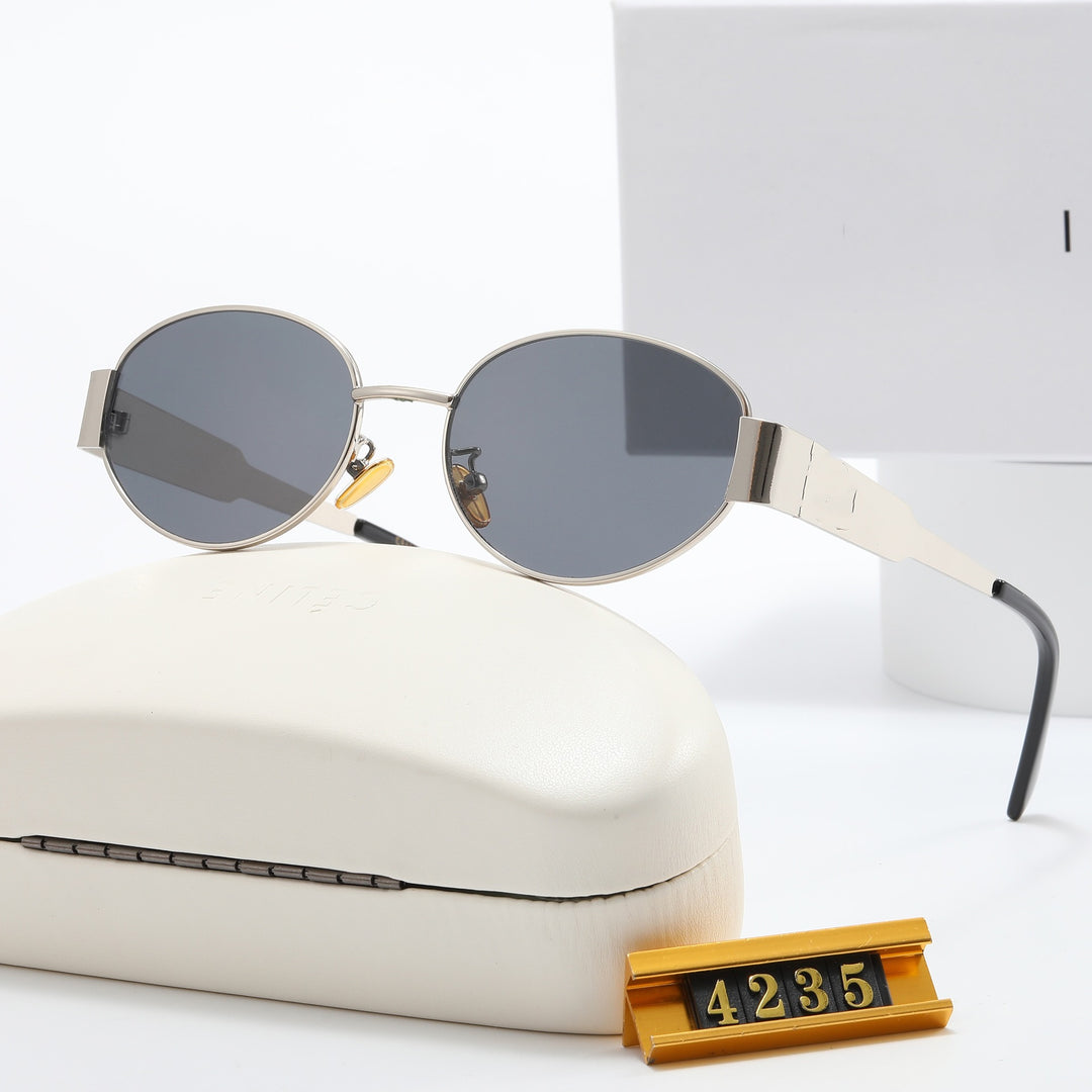 Ladies Elegant Designer Sunglasses with Filigree Frame and UV Protection Bowlift