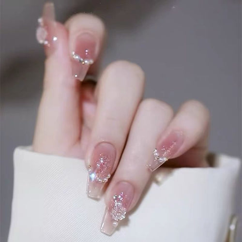 Artificial nails with heart design and glitter accents Bowlift