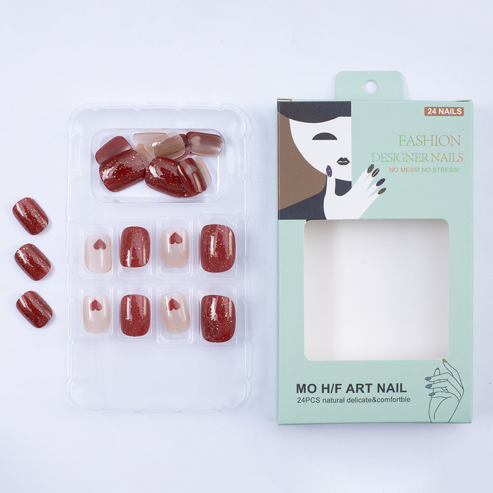 Art nail set with heart designs and glitter Bowlift