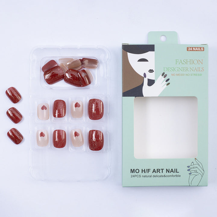 Art nail set with heart designs and glitter Bowlift