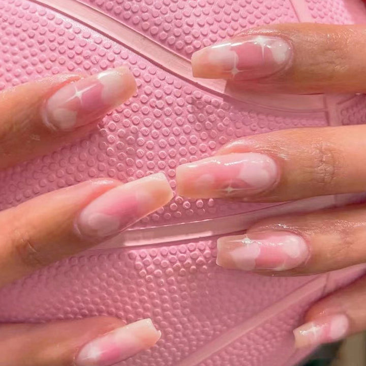 Artful Gel Nails with Elegant Floral Design and Glitter Accents Bowlift