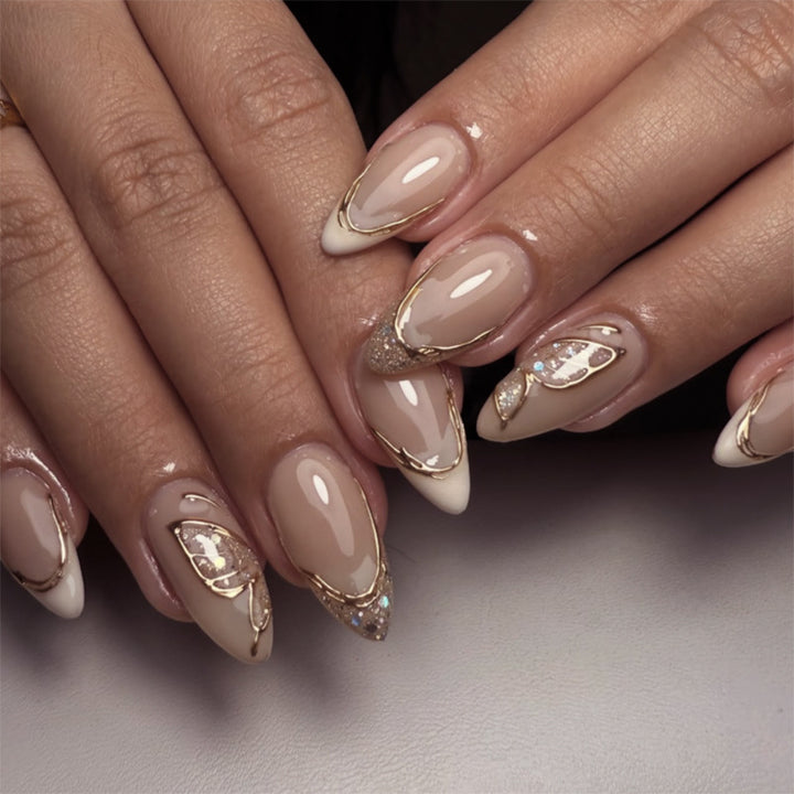 Elegant Stiletto Nails with Glitter and Spike Decorations Bowlift