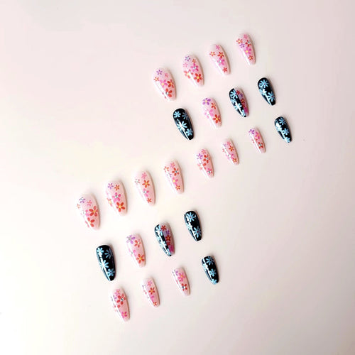 Artificial nail set with floral 3D embellishments and glitter accents Bowlift