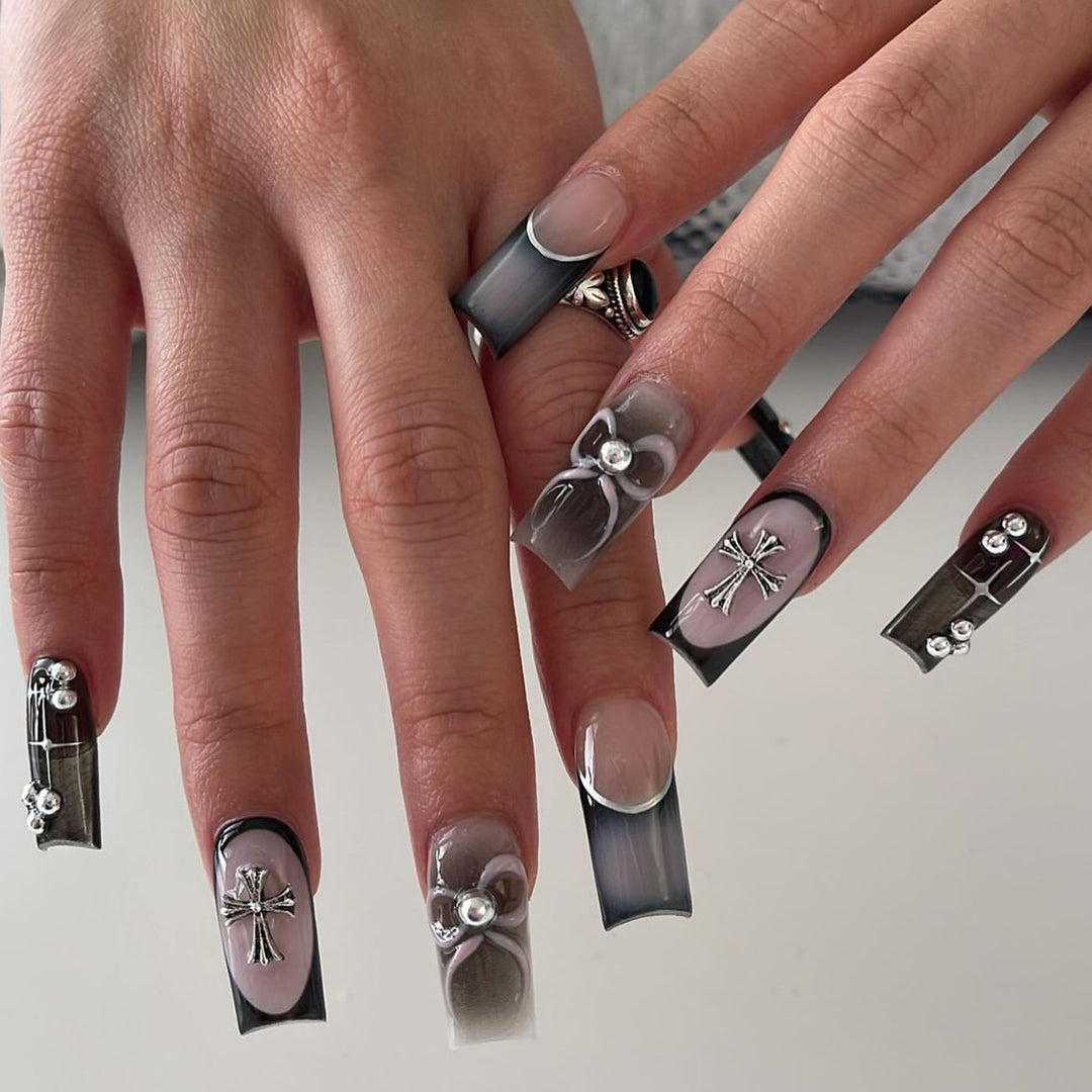 Artful acrylic nails with unique jewelry embellishments Bowlift