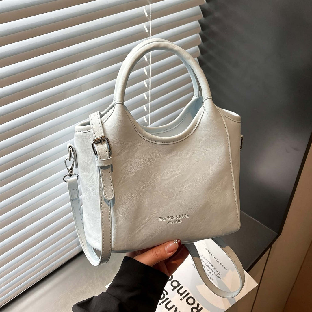 Sophisticated Designer Handbag Bowlift