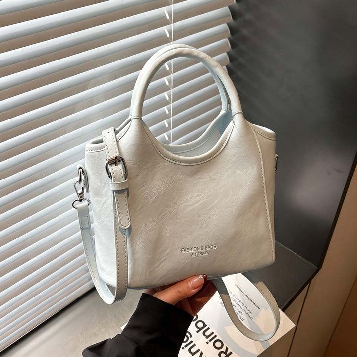 Sophisticated Designer Handbag Bowlift